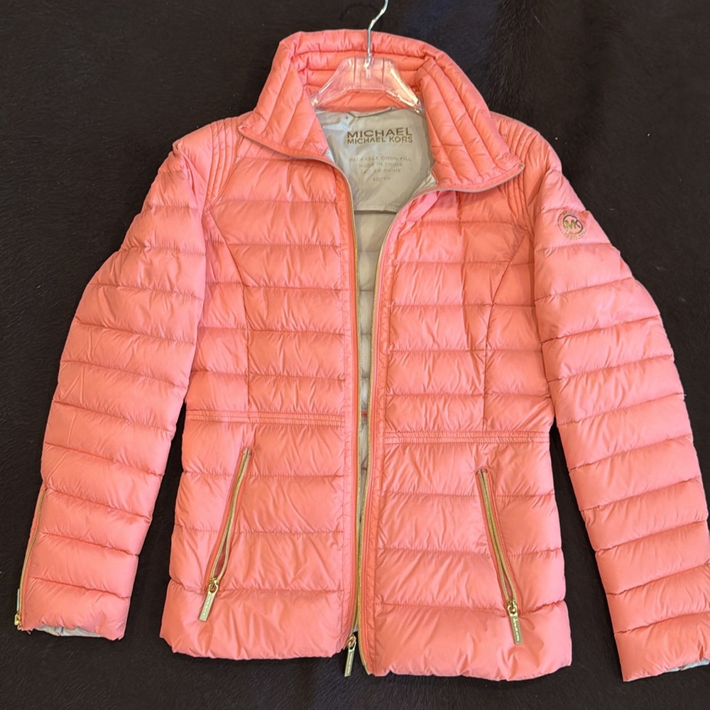 Beautiful jacket.Worn only one time.Down fill. Tailored  fit.